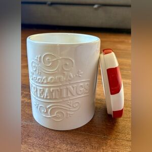 Hallmark Seasons Treatings ceramic jar/canister with a peppermint candy lid